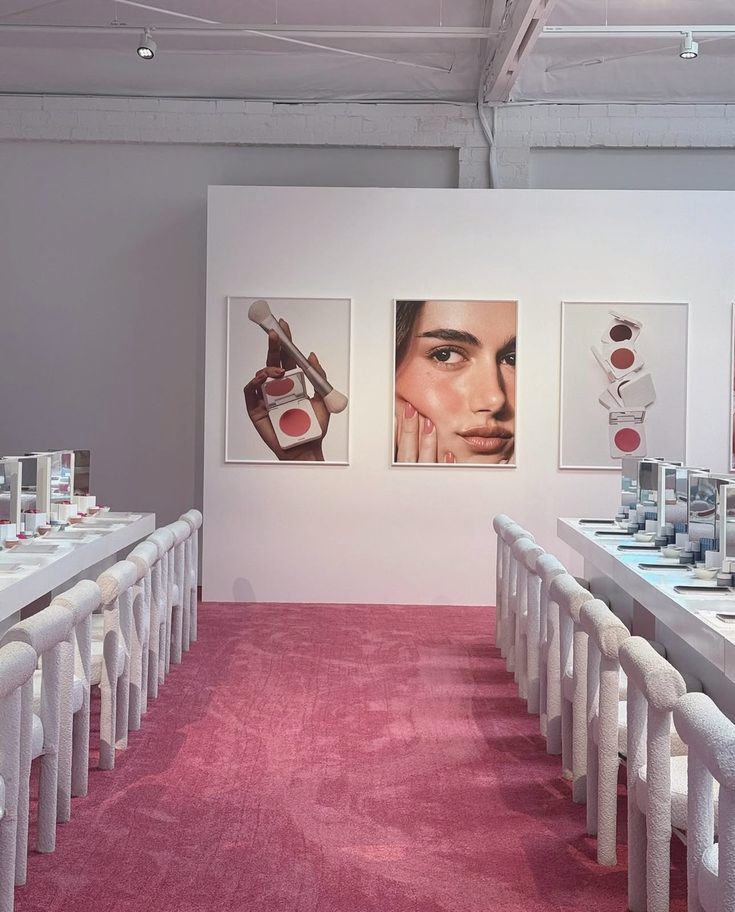 A beauty brand pop-up with makeup stations