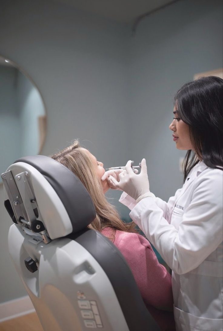 A practitioner giving a treatment